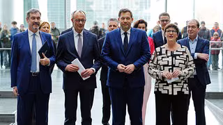 Koalitionsvertrag vorgestellt: Migration, Rente und Bürgergeld